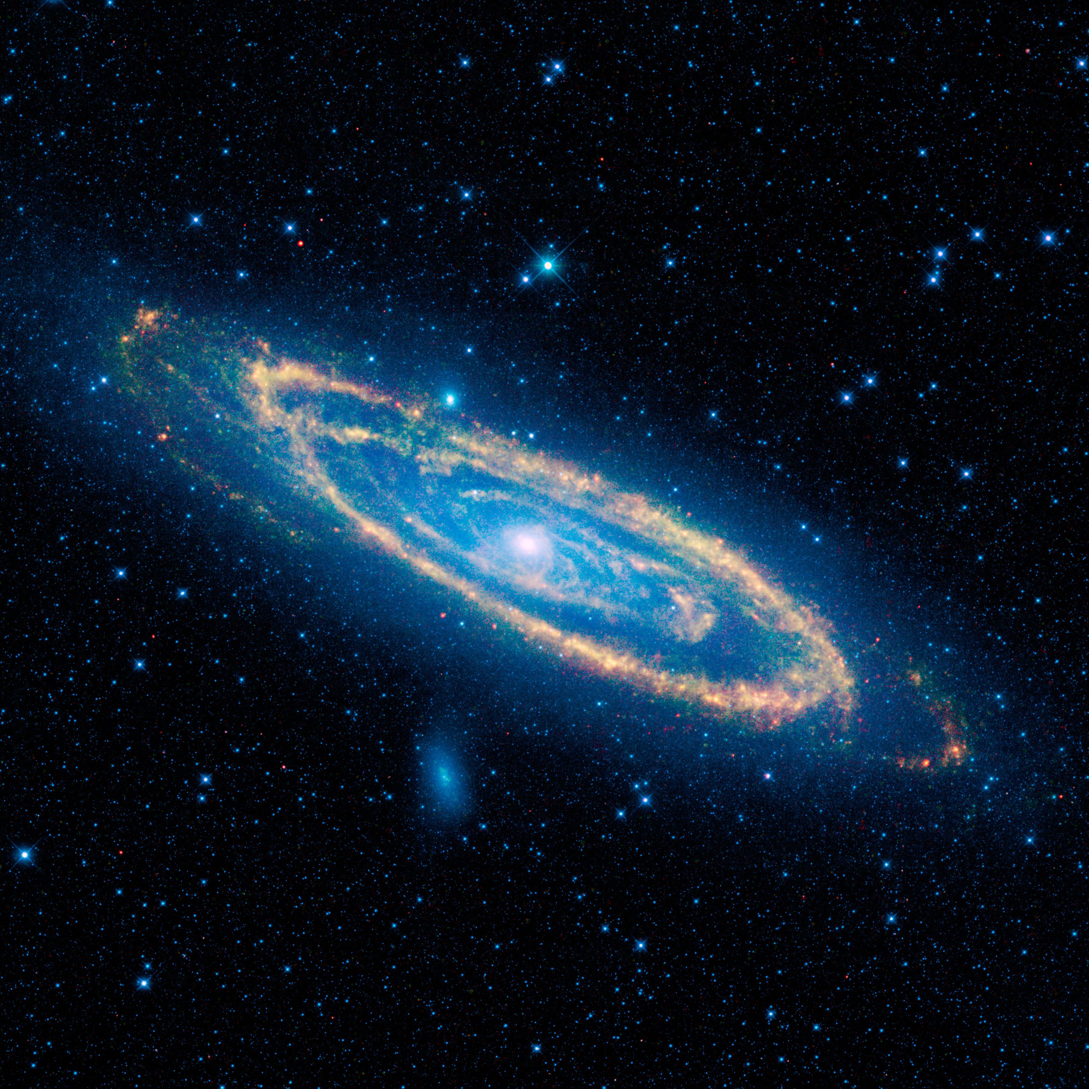 Galáxia de Andrômeda captada em infra-vermelho pelo telescópio espacial WISE, da NASA.